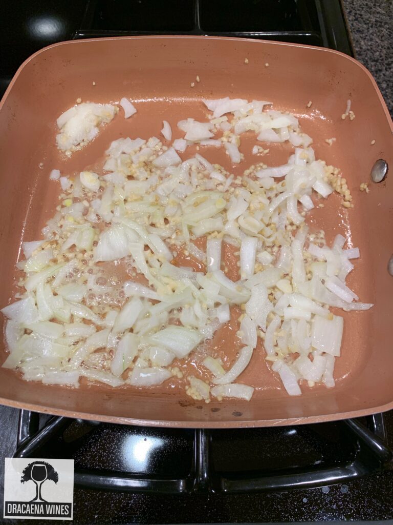 onions and garlic in sauté pan