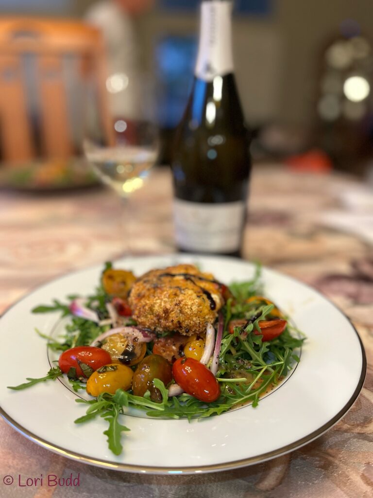 Arugula Salad with Fried Burrata, Balsamic Tomatoes and Lemon Poppyseed Dressing