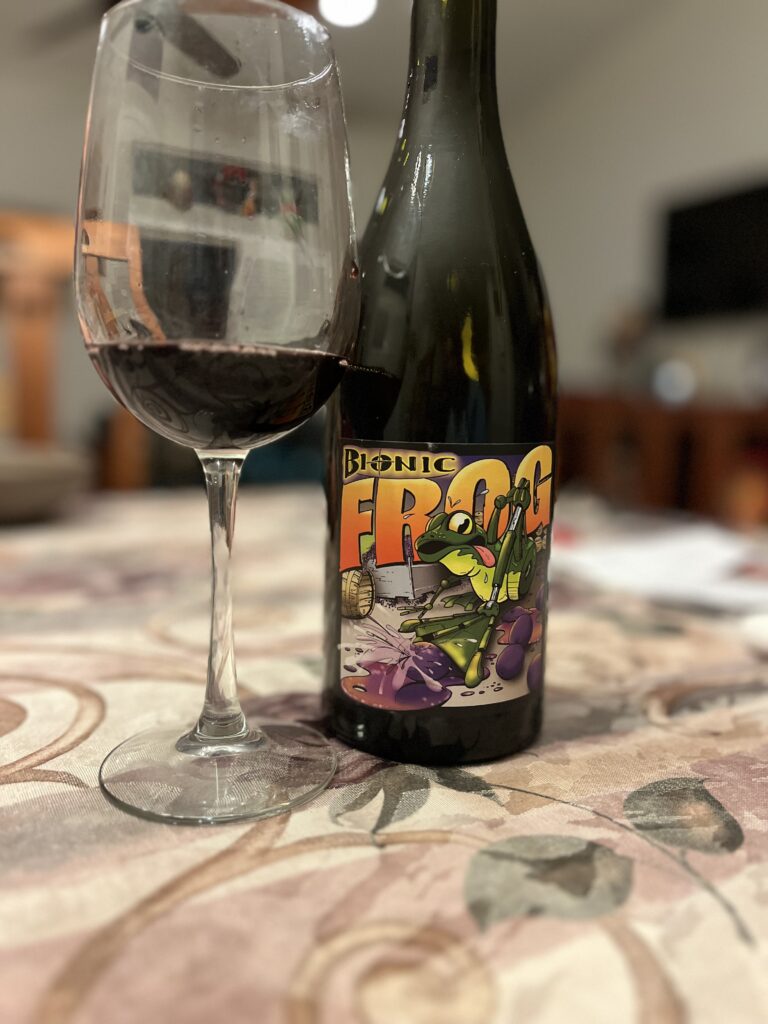 bottle with a glass poured of 2010 Bionic Frog