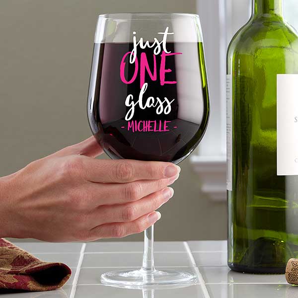a large personalized glass that says just one glass