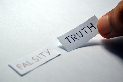 falsity vs truth. two words